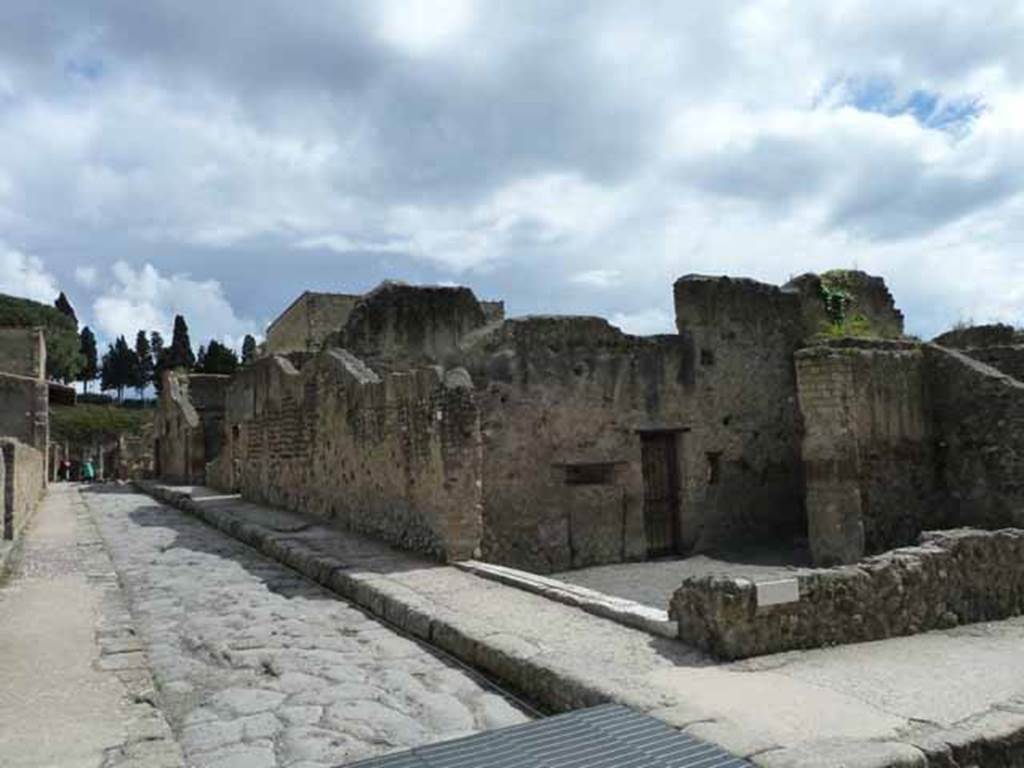 Decumanus inferior, Herculaneum. May 2010. Looking east along north side of Ins. III, and III.6, on its corner.